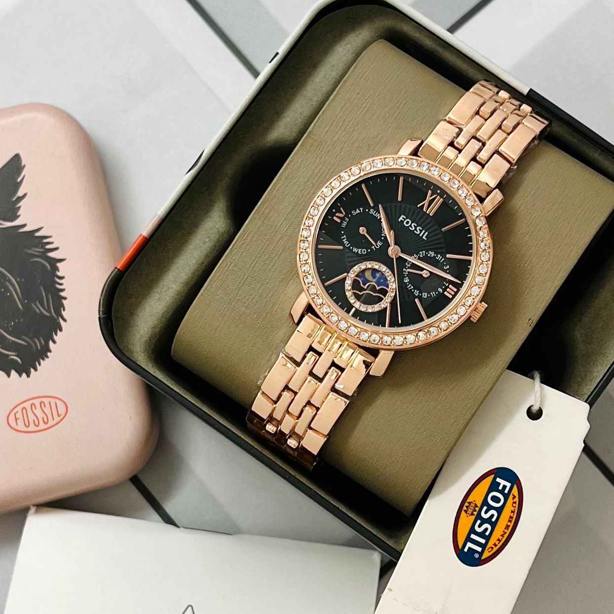 FOSSIL SUN MOON