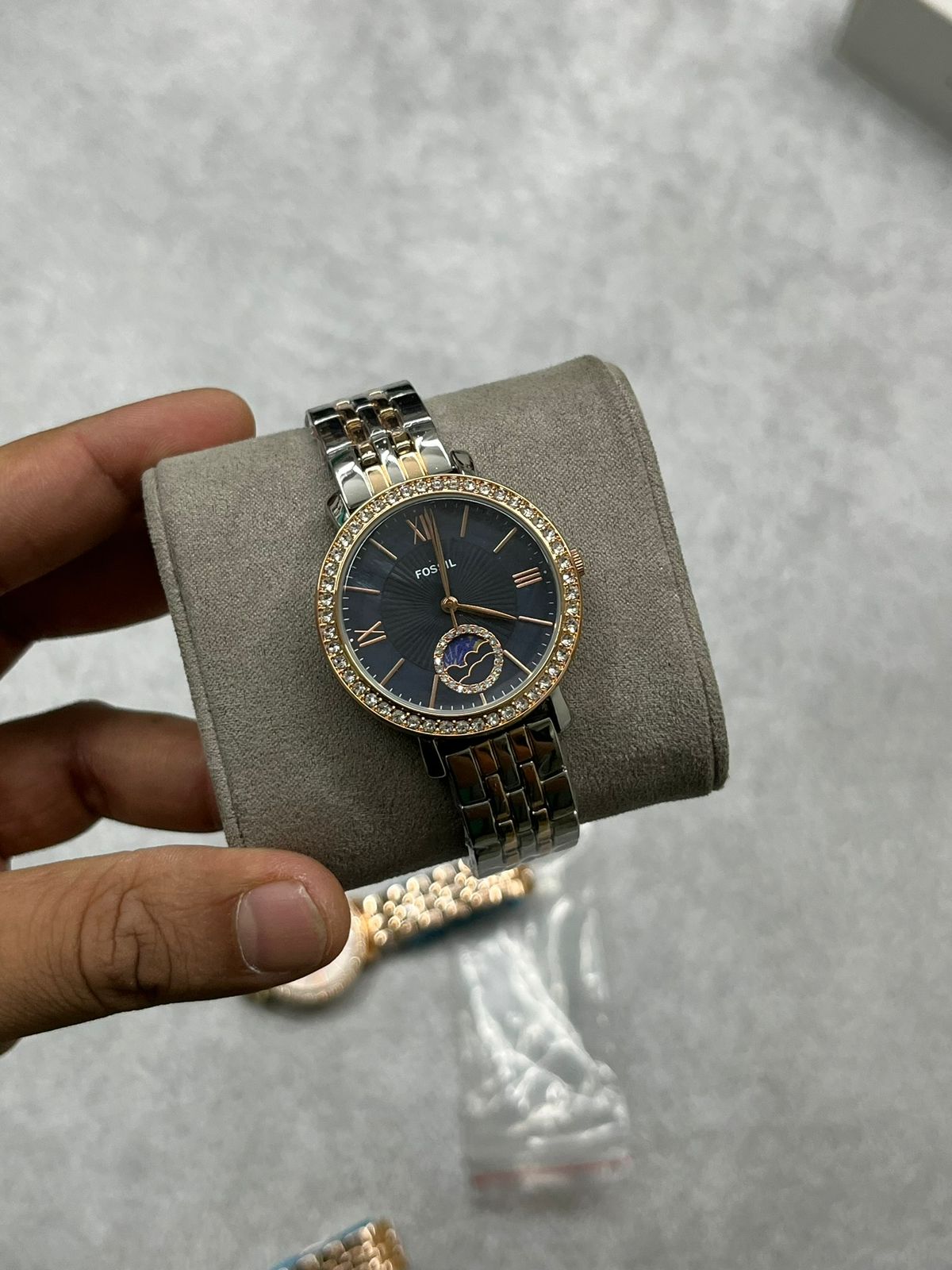 FOSSIL SUN MOON